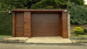 A wood garage door, one of many types of garage doors