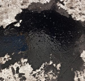 how to remove oil stains from garage floor